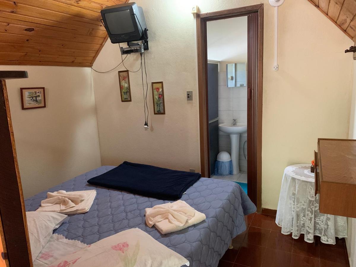 Pousada & Camping Serras Verdes กงแซร์วาตอเรีย ภายนอก รูปภาพ
